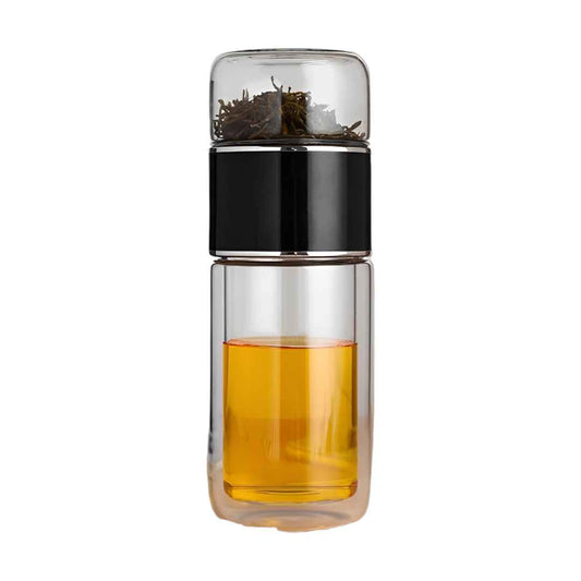 Image d'une tasse noire à double paroi en verre isotherme avec un infuseur, idéale pour préparer et conserver votre infusion ou votre thé préféré à la température parfaite.