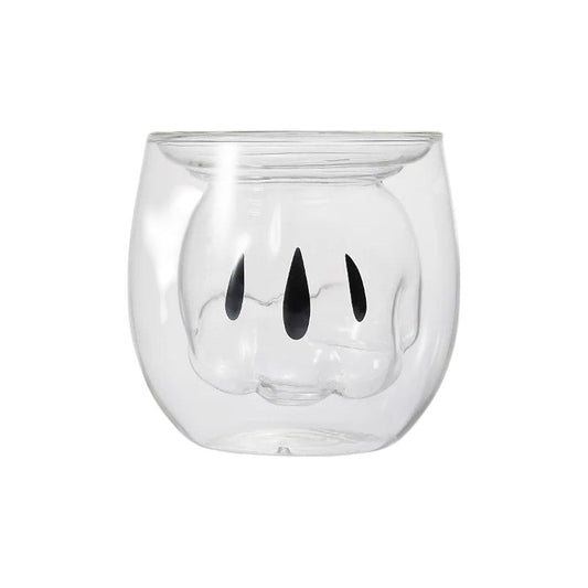 Une tasse à double paroi en forme de gant de Mickey Mouse, avec les doigts caractéristiques en relief et de couleur blanche.